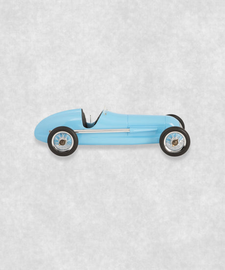 Vintage racing silberfeil car model inspired by classic Grand Prix racers and Silver Arrow legends, featuring a blue race car body with a striking black seat. A collectible car model for motorsport and classic car enthusiasts. Viewed from the right side.