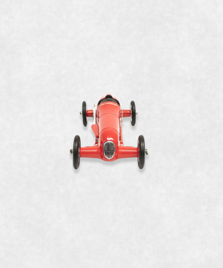 Vintage racing silberfeil car model inspired by classic Grand Prix racers and Silver Arrow legends, featuring a red race car body with a striking black seat. A collectible car model for motorsport and classic car enthusiasts. Viewed from the front