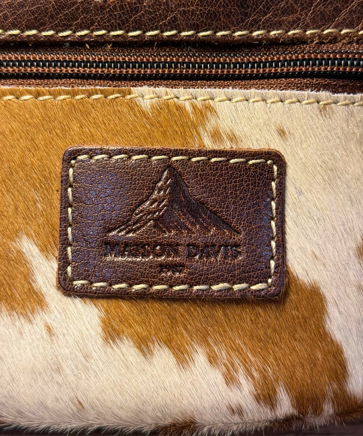 Detailed shot of cowhide belt bag leather