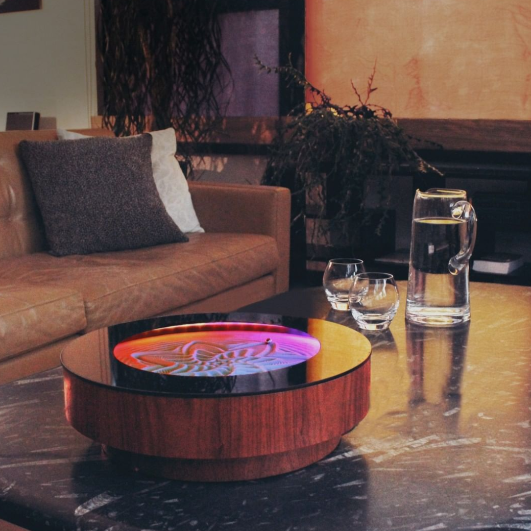 Elegant Kinetic Stand with magnetic mechanism creating evolving sand designs