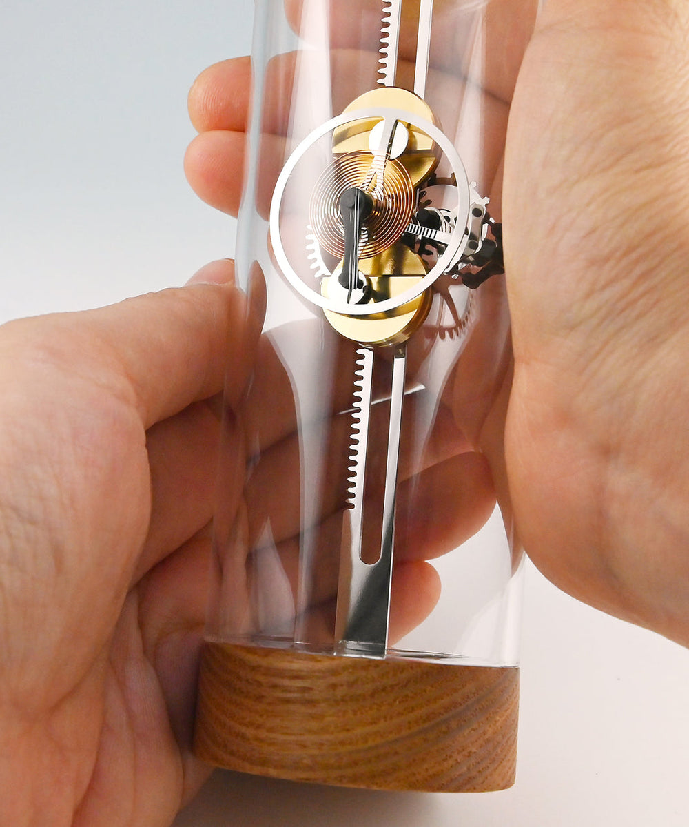 Mechanical oscilloglass Hands Close up