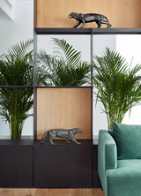 Handcrafted black panther sculpture used as a striking decor piece in a stylish home interior, made in Spain