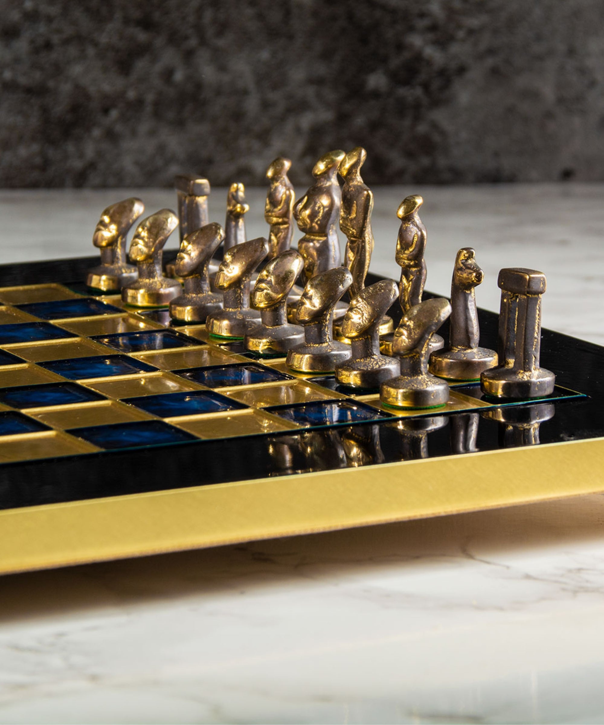 cycladic art chess zoom on chessmen brown