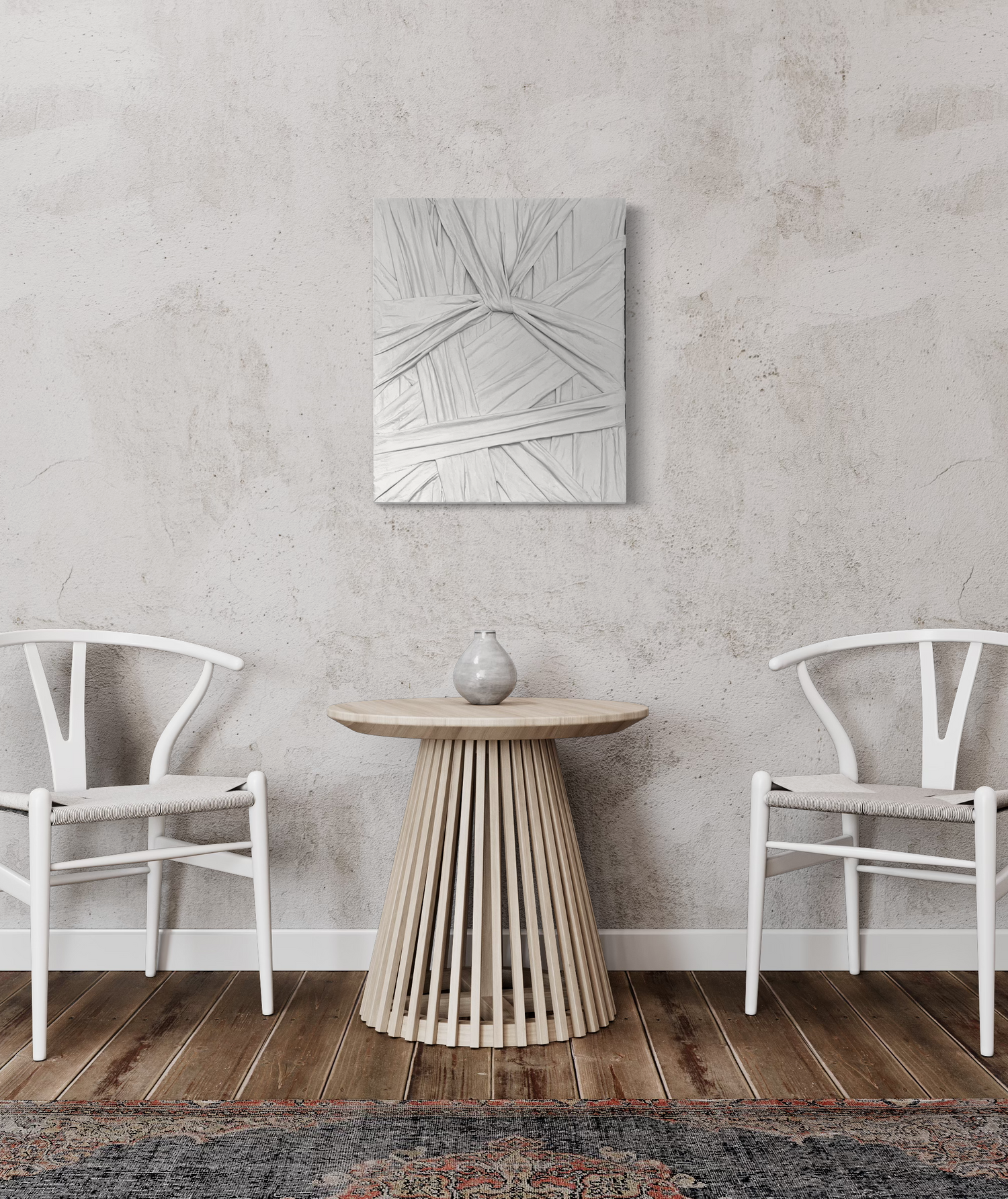 Grey wall sculpture titled 