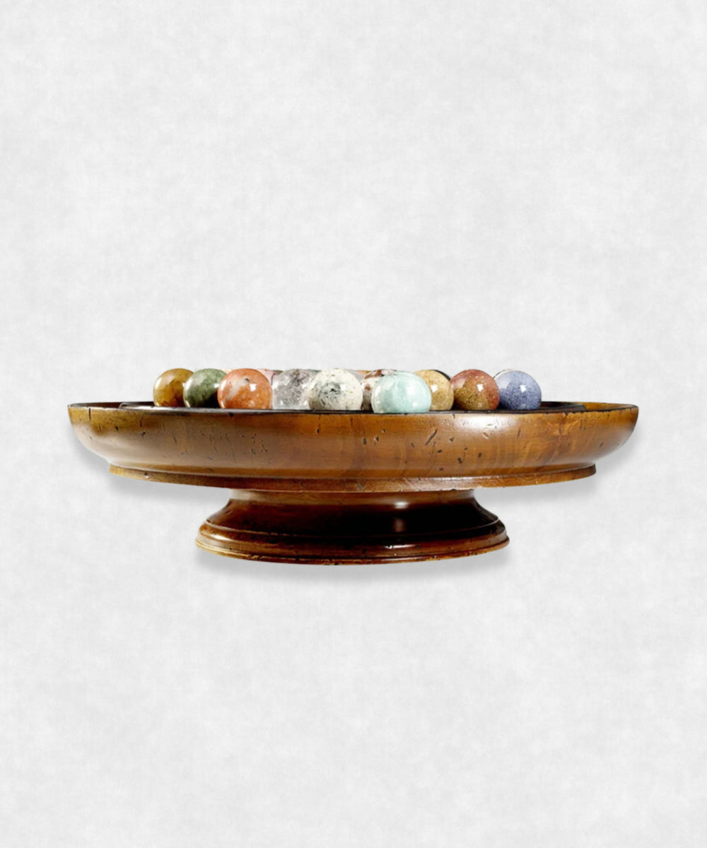 Side profile highlighting handcrafted details of solitaire game made from precious gemstones