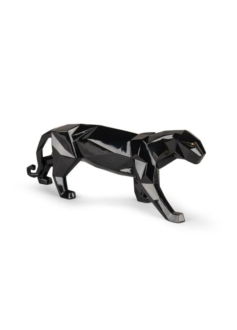 Side view of handcrafted glossy black porcelain panther sculpture made in Spain
